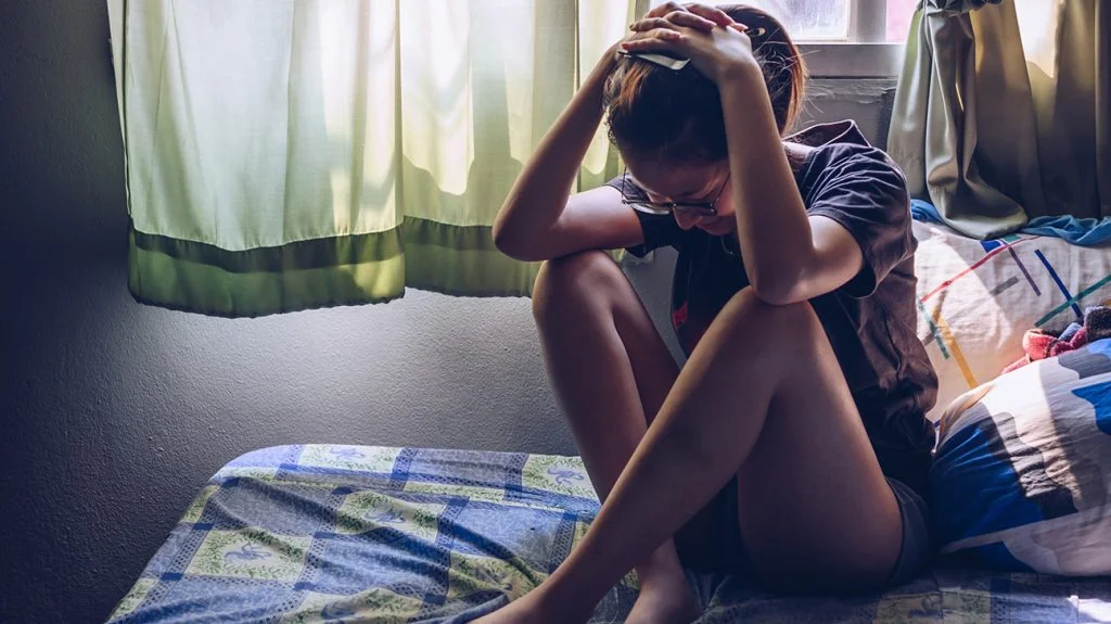 What does a headache on top of the head mean?